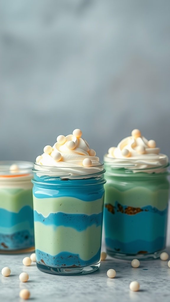 Colorful layered pudding in jars representing a mermaid theme. Mermaid party food
